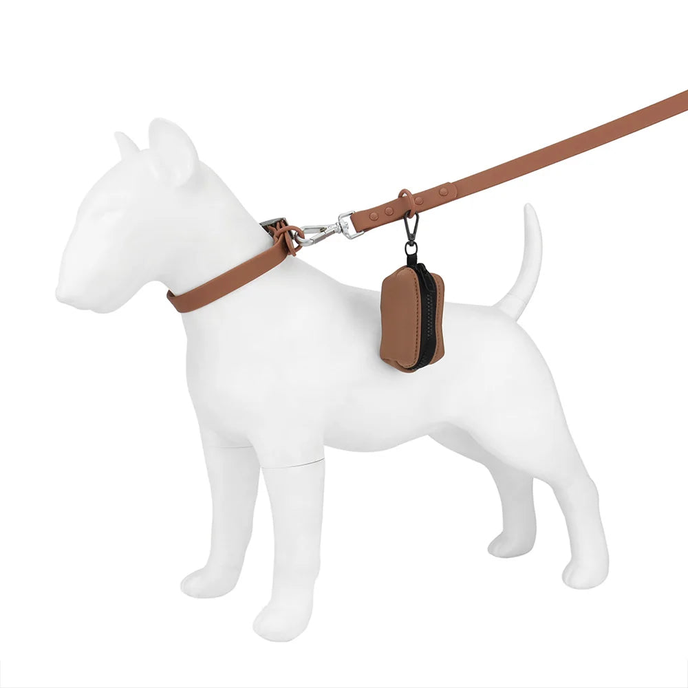 Dispensador de bolsas para excrementos de perro portátil